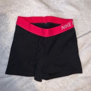 Nike running spandex shorts with pink trim
